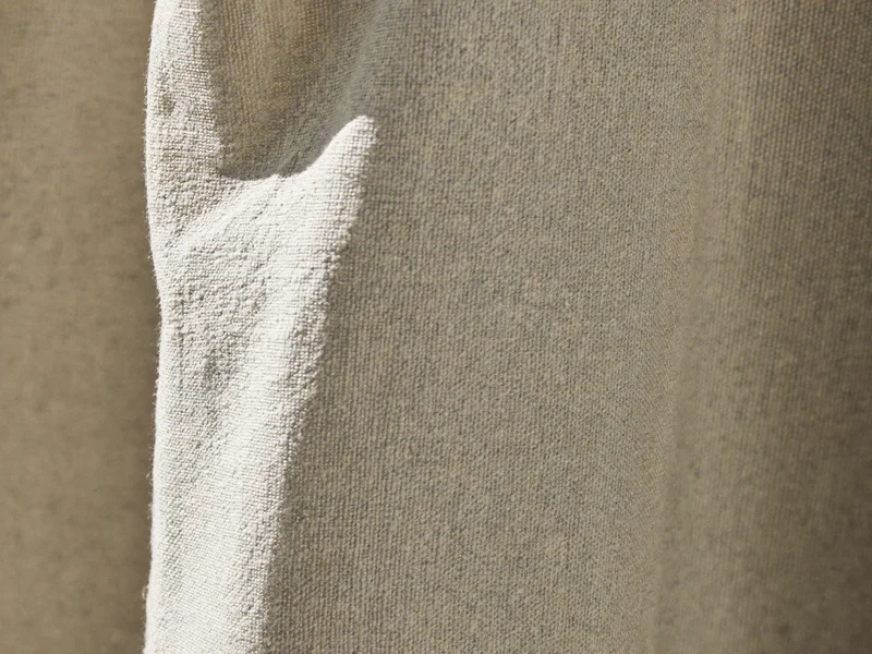 Gros plan sur la texture d'un tissu de lin tissé